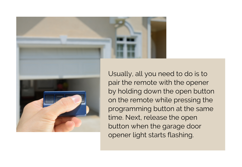 A person's hand holding a garage door remote control with a blurred garage door in the background in San Diego, CA.